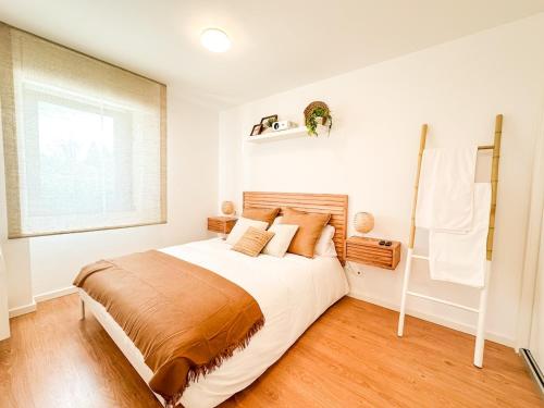 Ένα ή περισσότερα κρεβάτια σε δωμάτιο στο Apartamento Nautilus by ALÔGA