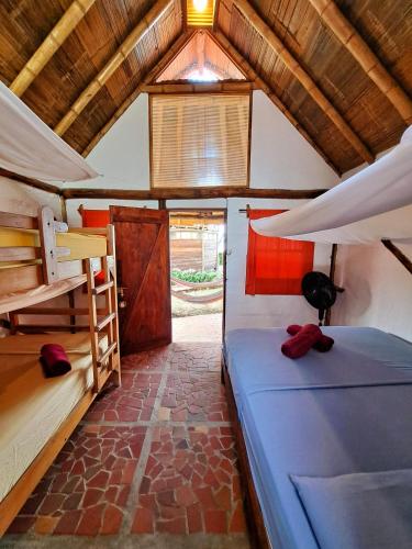 Cama o camas de una habitación en Cabañas La Tortuga