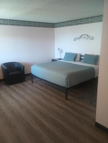 Ένα ή περισσότερα κρεβάτια σε δωμάτιο στο Coast Riders Inn
