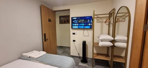 Ein Bett oder Betten in einem Zimmer der Unterkunft Hotel RUTA365