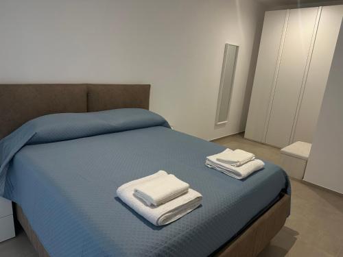 Postel nebo postele na pokoji v ubytování B&b al borgo