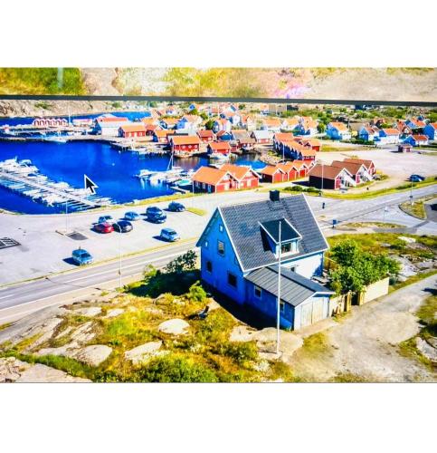 an aerial view of a harbor with a marina at Oceanfront Coolcation on West Coast with incredible ocean views! in Kungshamn