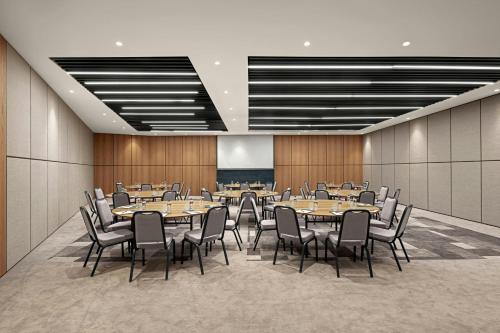 a conference room with tables and chairs in it at Four Points by Sheraton Istanbul Pendik in Istanbul