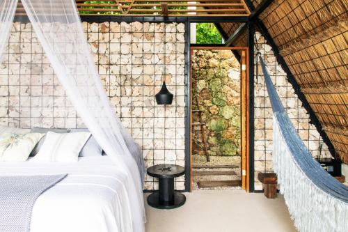 Cama o camas de una habitación en Azul Nomeolvides Bacalar - Guests Only