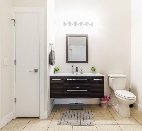a bathroom with a sink and a toilet at Prime Location min from Philly & Transit - in Norristown