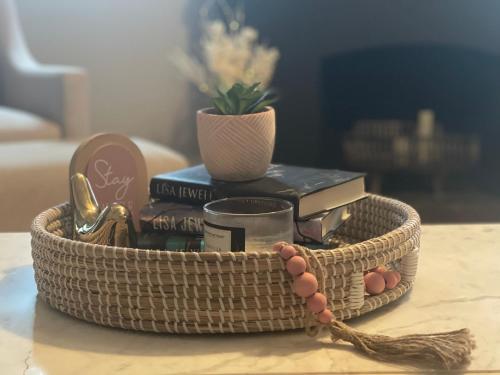a basket filled with items on a table at Come home to Kenwood Conveniently located Syracuse in Syracuse