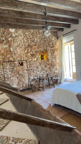 Una cama o camas en una habitación de Can Bagot