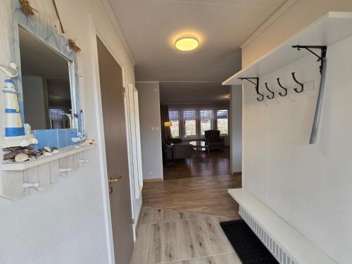 a hallway with a room with a cake on a wall at Blanka10 in Blankaholm