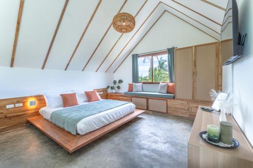 Postel nebo postele na pokoji v ubytování Vintana Villa