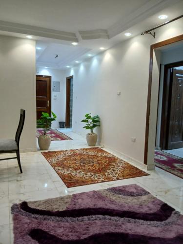 Ένα ή περισσότερα κρεβάτια σε δωμάτιο στο 378 Pyramids apartment