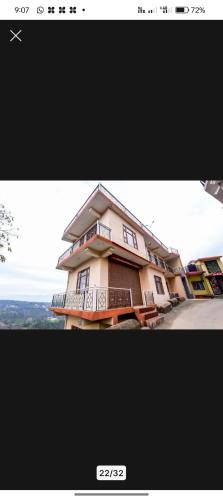 a picture of a building with at Prem Home Stay in Sundarnagar