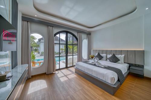 Ένα ή περισσότερα κρεβάτια σε δωμάτιο στο Cipta Hotel Uluwatu
