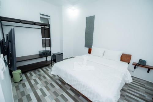 Uma cama ou camas num quarto em Bona Hotel