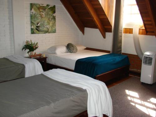 Postel nebo postele na pokoji v ubytování Private rooms, 10 min from SJO Airport