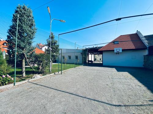 an empty parking lot in front of a building at Dalmo in Sedlec
