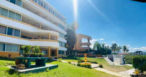 Zahrada ubytování Hotel en Teques con Alberca