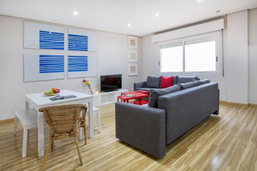 Χώρος καθιστικού στο Mola Suites