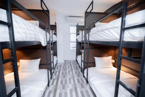 Postel nebo postele na pokoji v ubytování Bona Hotel