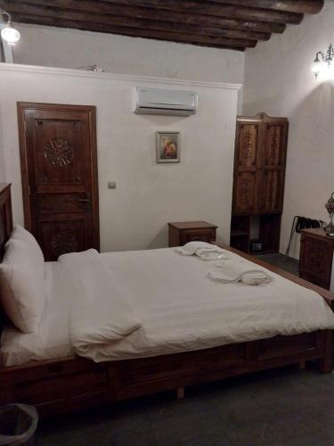 Ένα ή περισσότερα κρεβάτια σε δωμάτιο στο ORPHEUS OTEL-Konak