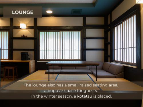 Posezení v ubytování BUNA KUSATSU Onsen Inn