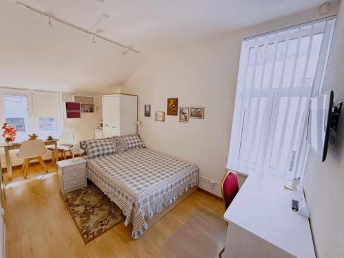 Ένα ή περισσότερα κρεβάτια σε δωμάτιο στο Tallinn Apartments K8 Free parking