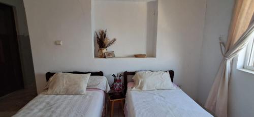 Postel nebo postele na pokoji v ubytování Casa Tota