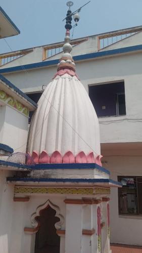 a building with a dome on top of it at Sri Chaitanya Saraswat Math in Krishnanagar