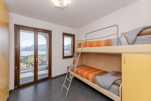 Ένα ή περισσότερα κρεβάτια σε δωμάτιο στο CASA ELENA - Bella vista lago