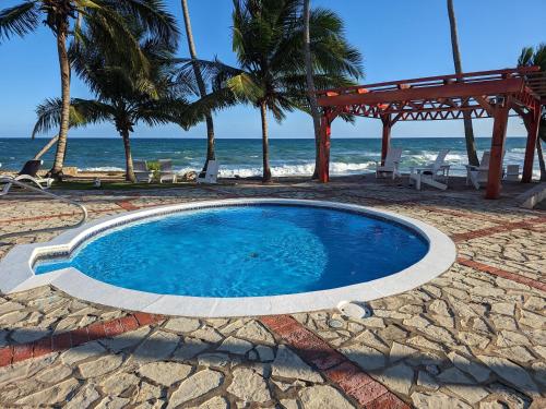 Бассейн в Jardines del Mar Todas las Amenidades Reserva Inmediata или поблизости