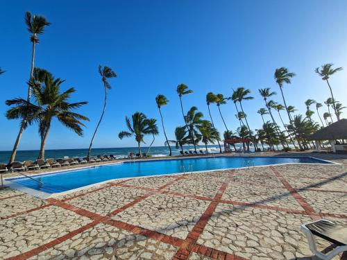 Бассейн в Jardines del Mar Todas las Amenidades Reserva Inmediata или поблизости