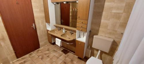 Phòng tắm tại Apartments Sunshine Milin