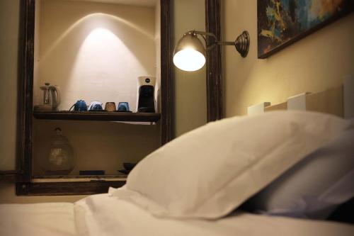 Letto o letti in una camera di Affittacamere Alle Volte