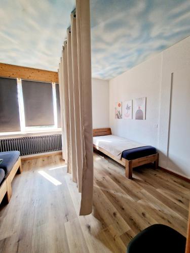 Postel nebo postele na pokoji v ubytování Casa Maria West