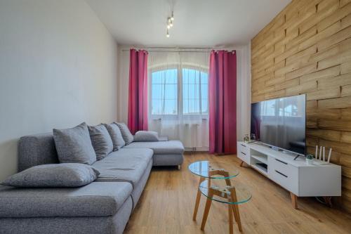 Televízia a/alebo spoločenská miestnosť v ubytovaní Relax & Luxury A4 apartment