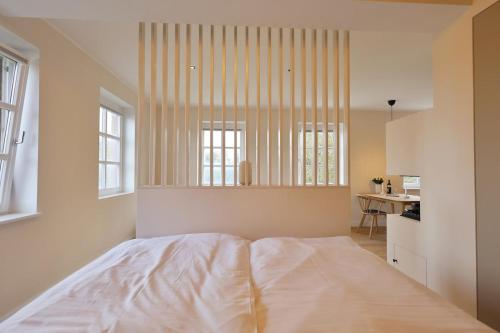 Giường trong phòng chung tại Kleines Piratennest - Am Meer