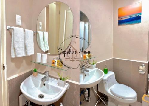 a bathroom with two sinks and a mirror at Sapphire Haven at Grand Residences Cebu East Tower B in Cebu City