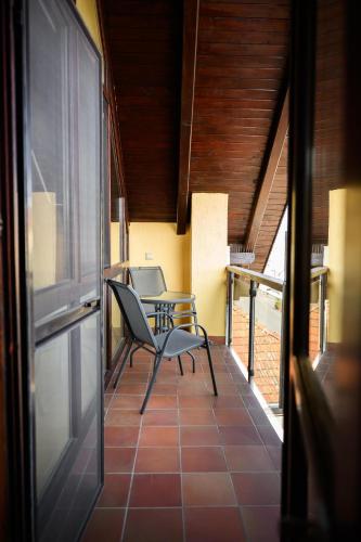 Balkón nebo terasa v ubytování Essence Apartman Tokaj