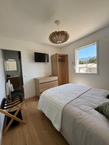 Postel nebo postele na pokoji v ubytování Chambre d'hôtes AU CHAUVET