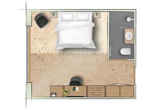 a floor plan of a room with a bed at Heeren van Noortwyck in Noordwijk aan Zee
