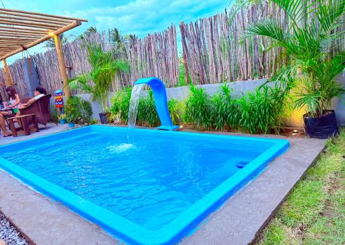 Hồ bơi trong/gần L2 Localize casa na praia pontal