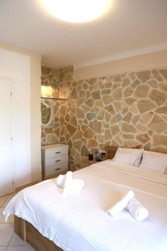 Ένα ή περισσότερα κρεβάτια σε δωμάτιο στο Studio Apartment Petra