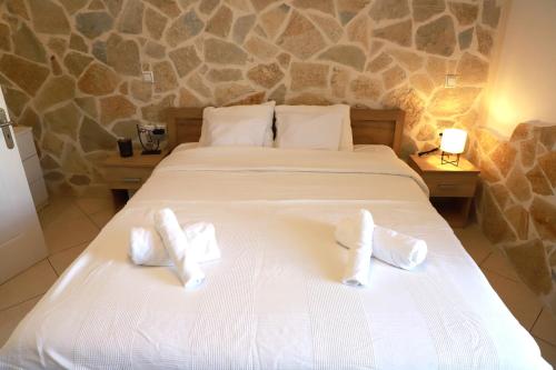Ένα ή περισσότερα κρεβάτια σε δωμάτιο στο Studio Apartment Petra