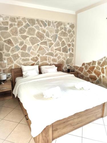 Ένα ή περισσότερα κρεβάτια σε δωμάτιο στο Studio Apartment Petra