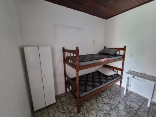 Katil atau katil-katil dalam bilik di Pousada Dona Zilma Refugio Paradisíaco 2