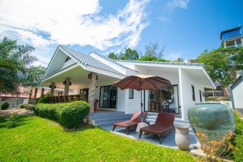 Κήπος έξω από το Windy House By Serenity Sea House