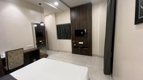 Hotel Ranjeetにあるベッド