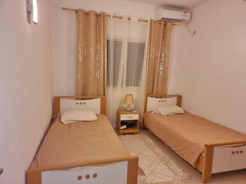 Katil atau katil-katil dalam bilik di Villa Dar Abdou Djerba sans vis à vis