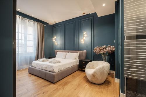 Katil atau katil-katil dalam bilik di Luxury Suites in the Heart of Cagliari