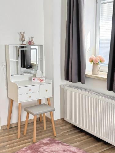 Η κουζίνα ή μικρή κουζίνα στο Deluxe Apartments Franken