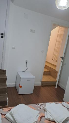 Postel nebo postele na pokoji v ubytování Casa Cristiana Moisei